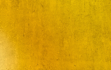 Golden cement wall for design and texture background.