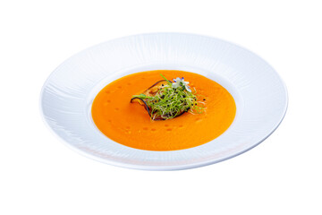 Vegetable cream soup, isolated white background.