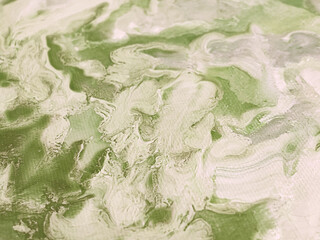 白、緑のマーブルの絵の具の背景