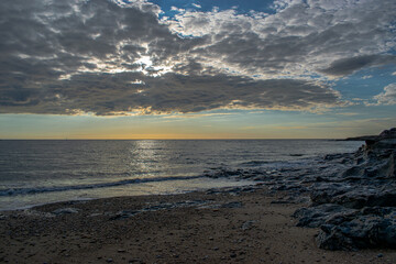Vendée, sunset over the ocean from the corniche of Bretignolles sur Mer, France.