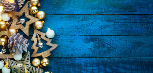 A Blue Christmas banner background with hand-made decoration stars and  Christmas tree
