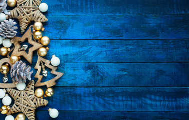 A Christmas wooden natural decoration ornament; wide horizontal banner background with copyspace
