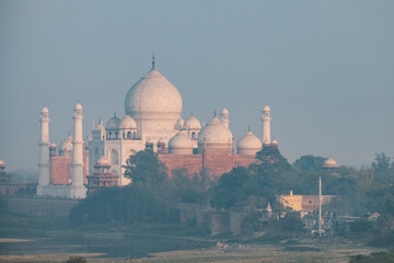 Taj Mahal seen in the distance from Agra Fort at sunset, Agra.