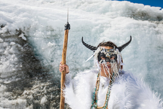 Aboriginal girl wearing face mask, dressed as mountain goat.
