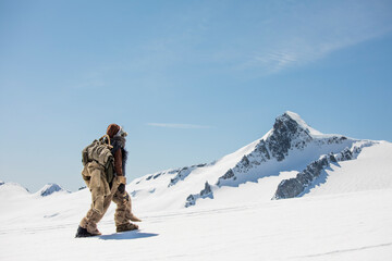 Native American mountaineer exploring in the mountains.
