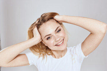 emotional blonde white t-shirt close-up studio lifestyle fun