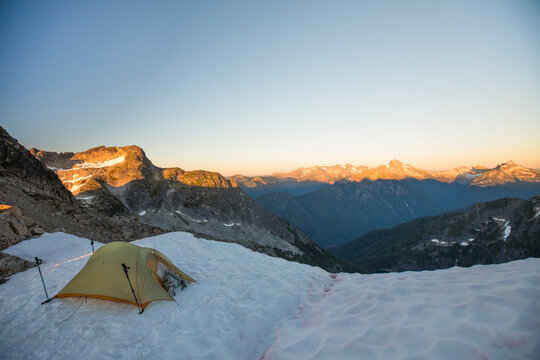 Tent perched on glacier in the North Cascade Mountain Range