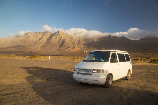 Camper van parked on Cofete beach in Fuerteventura.