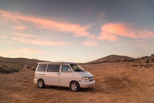 Family camper van parked on beach in Fuerteventura, Canary Islands, Spain.