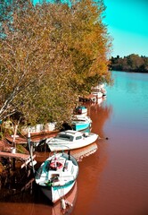 Naklejka premium boats on the river