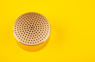 image of sound speaker yellow background 