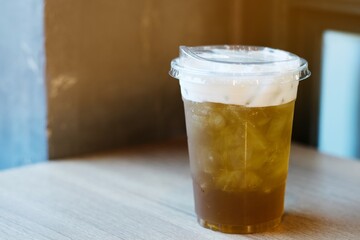 a glass of ice tea in cafe