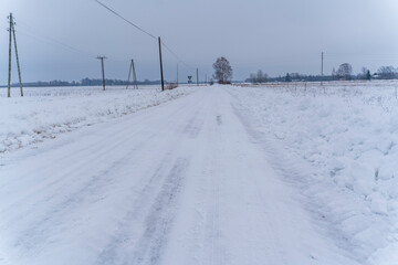 Cloudy Winter Day in Countryside - Road Leading Forward