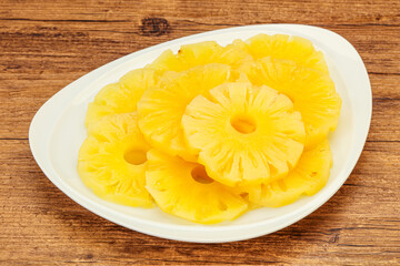 Marinated pineapple rings in the bowl