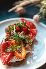 Appetizing bruschetta on a white plate. restaurant server
