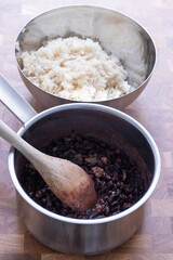 white rice and black beans cooking 