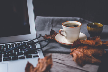 coffee and laptop in autumn, work from home concept