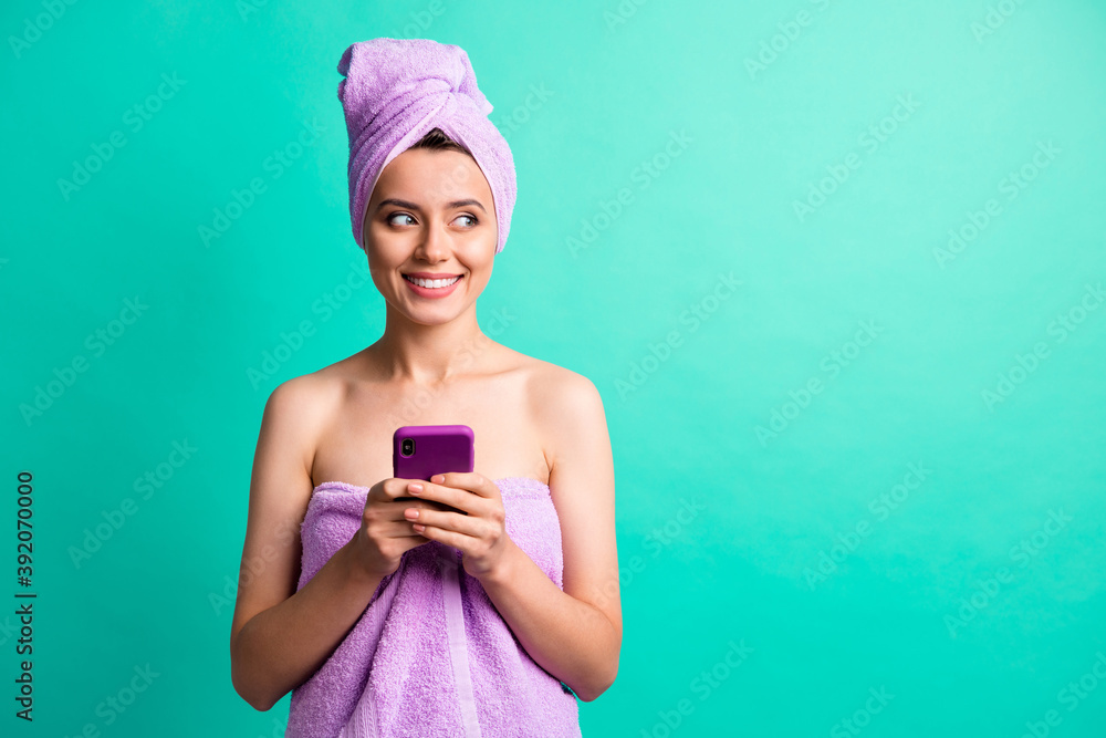 Sticker photo of beautiful lady hold telephone hands look side empty space wear violet towels isolated teal 