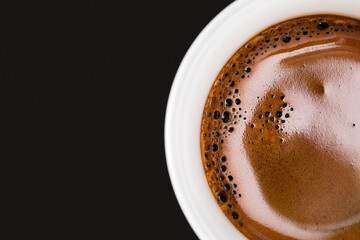 Espresso coffee macro crema closeup.