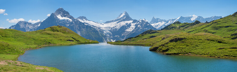 idyllic alpine lake Bachalpsee, tourist destination near Grindelwald, beautiful landscape switzerland