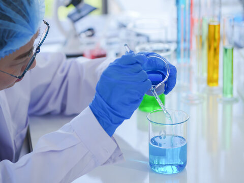 scientists working with lab equipments