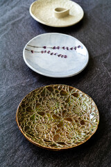 Handmade Ceramic Plates and Trays. Handcrafted with Traditional Ottoman Pattern on Dark Surface and Backround / Handicraft.