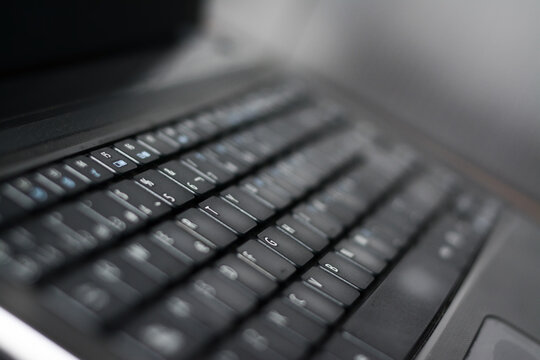 Computer keyboard close-up with empty space, laptop keyboard