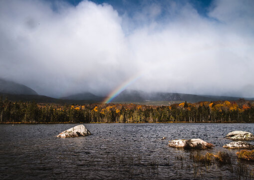 Rainbow forms over Sandy Stream Pond, Baxter State Park, Maine