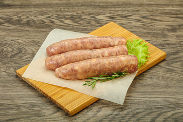 Raw pork meat sausages for grill