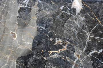 Patterned natural of dark gray marble (Gold Russia) texture for product design.