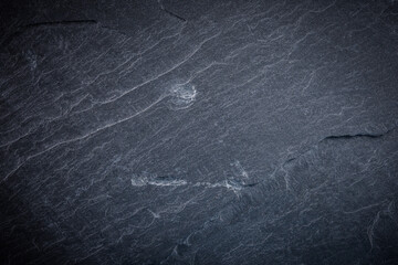 Dark gray slate texture, abstract background for tile design.