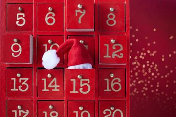 Red wooden Advent calendar with surprise for Christmas - Powered by Adobe