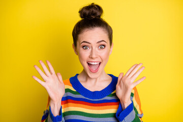 Photo of young beautiful girl excited amazed happy positive smile news discount isolated over...