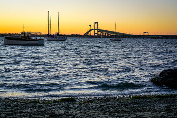 Newport Harbor at golden sunset.