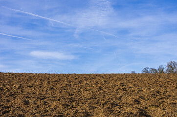 Ploughed Arable Land - A sunny ploughed arable land in spring.