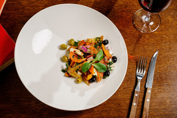 Salad baked eggplant and fresh tomatoes. Top view