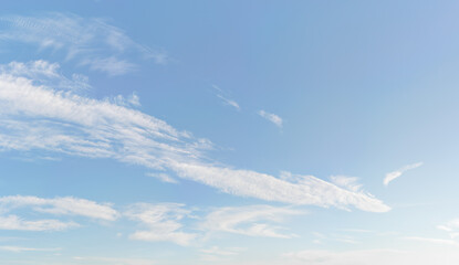 Bright sky background with few cirrus clouds