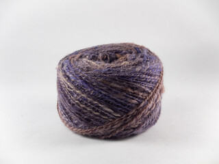 balls of handspun merino fibers isolated on a white background