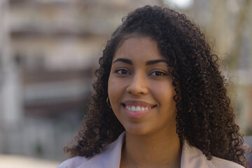 Black woman smilling on urban background