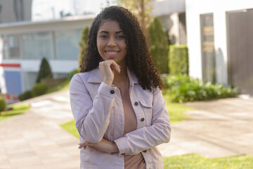 Black woman smilling on urban background