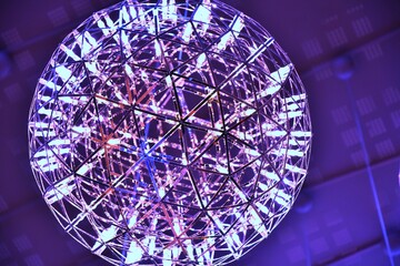 Blue Abstract background with blurred neon light. Blue backdrop with round diodes lamp.