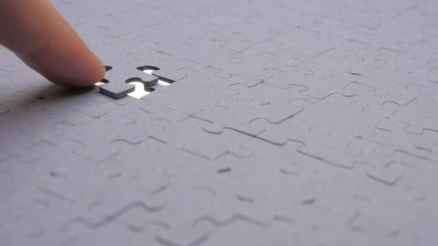 Last Piece of Puzzle for Whole Picture. Final Stage the Jigsaw Puzzle Coming Down into its Place. Part of the Whole. Finding a Solution. Mission Completed. Goal, Plan, Idea. View from Below Copy Space