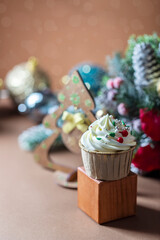 Homemade christmas cupcakes with different decorations. New year food concept.