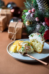 Homemade christmas cupcakes with different decorations. New year food concept.