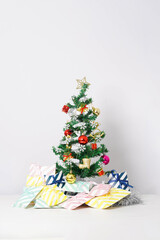 Christmas composition with decorations and gift box with bows on white background. winter, new year concept. Flat lay, top view, copy space.