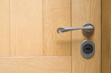 New lock on a wooden door close
