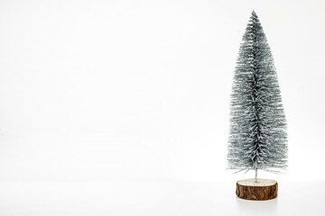 Decorative Christmas tree on a white background close-up with a place for the text.