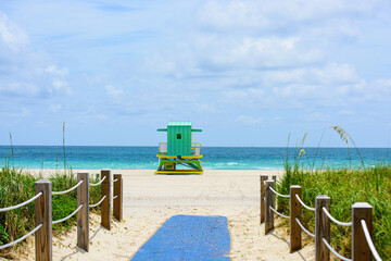 Sunny day in Miami beach. Miami Beach, Florida, USA sunrise and life guard tower.