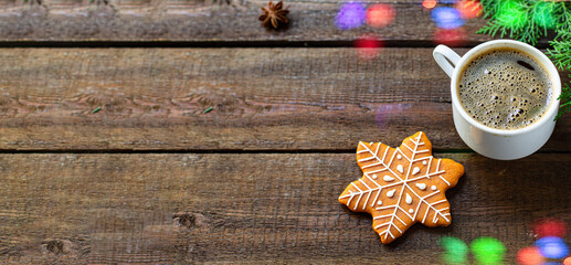 gingerbread background cookie cup of coffee or tea bokeh garland multicolored blur new year gift christmas festive table setting holidays party top view copy space food rustic