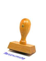Stempel mit dem Aufdruck Reisewarnung